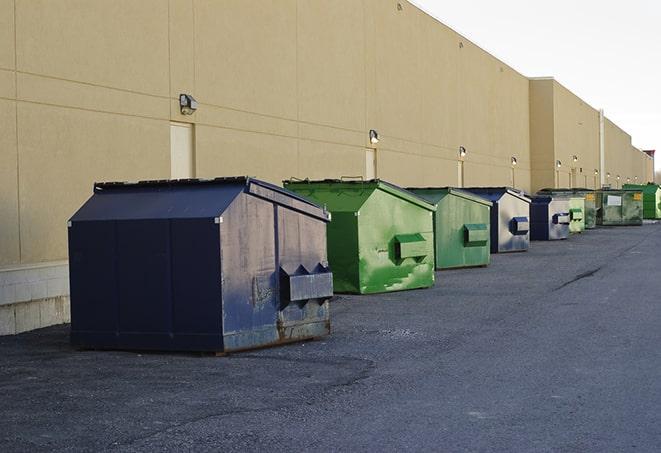 a large dumpster serves as a temporary waste container on a job site in Haltom City